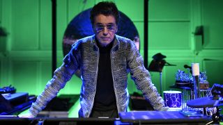 French composer and producer Jean-Michel Jarre poses on stage during a photo session at the Ircam music studio in Paris, on January 13, 2023. (Photo by STEPHANE DE SAKUTIN / AFP)