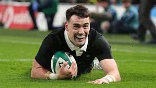 New Zealand's Will Jordan scores a try against Ireland in November 2024