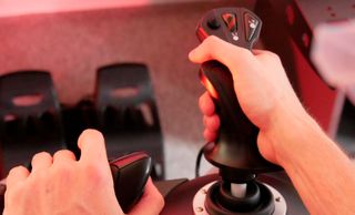 A person playing a game on the thrustmaster HOTAS