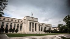 storm clouds over Federal Reserve building