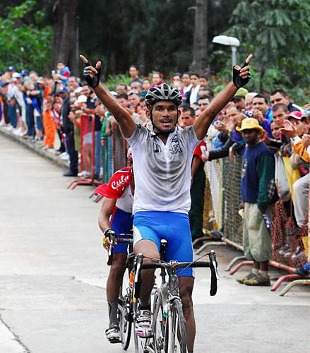 Jose Alarcon wins stage eight in Topes De Collantes.