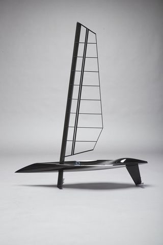 View of a black futuristic style boat pictured against a grey background
