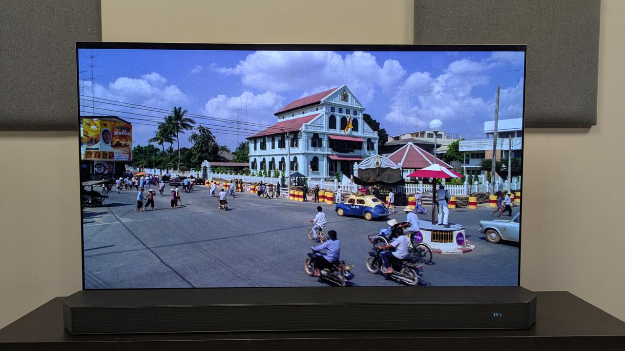 Bullet In The Head 4K Blu-ray on LG G5 showing a brightly colored building in Saigon