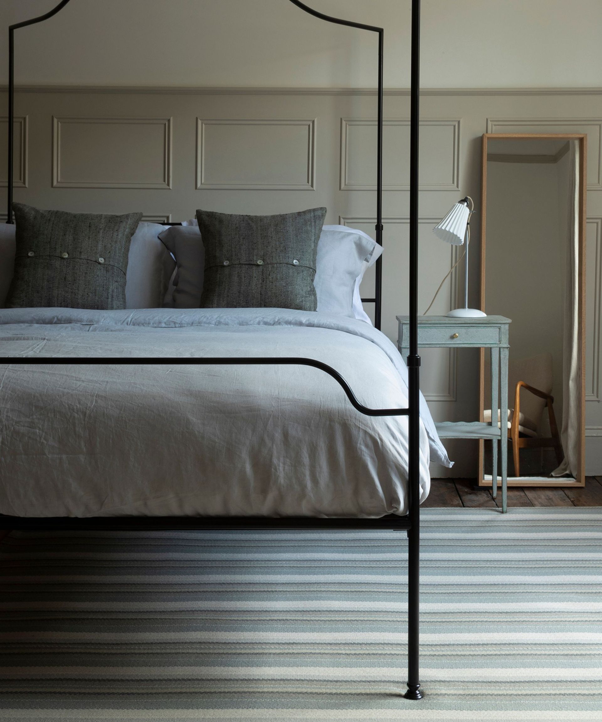 striped carpet in bedroom