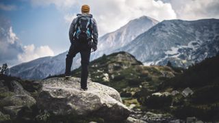Best hiking backpack: A hiker in the mountains