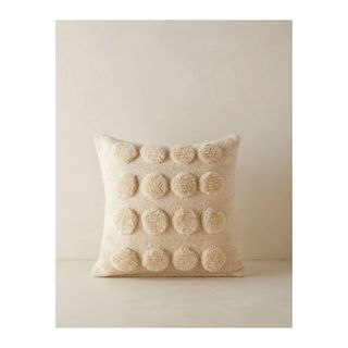 throw pillow in cream with textured circles