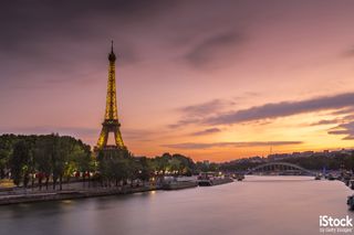 Sunset at Eiffel Tower on the Seine river in Paris, by Joakim Leroy