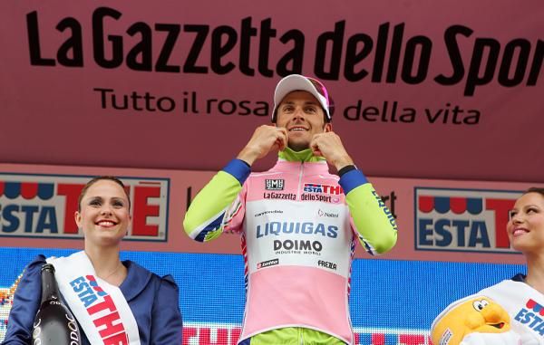 Ivan Basso puts on the maglia rosa for the first time since his 2006 overall win.