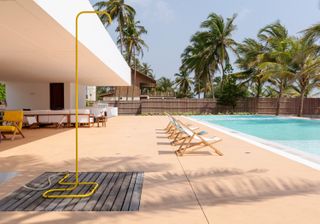 structure and pool at Coral Pavilion by tosin oshinowo