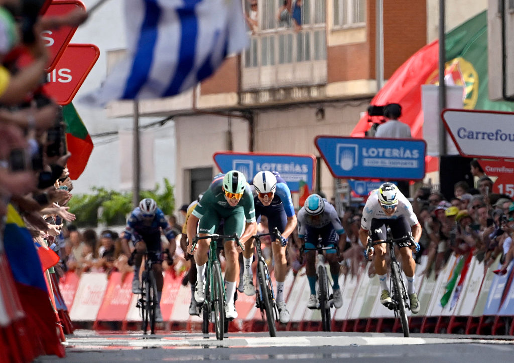 Team Lidl-Trek's Danish rider Mads Pedersen (L) competes to cross first the finish line during the 15th stage of the Vuelta a Espana cycling tour, a 167 km race between A Veiga/Vegaredo and Monforte de Lemos, on September 7, 2025. (Photo by Miguel RIOPA / AFP) (Photo by MIGUEL RIOPA/AFP via Getty Images)