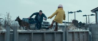 Ray Monroe (Sam Worthington) rushes to save his daughter (Lucy Capri) from falling backward off a high ledge in Fractured