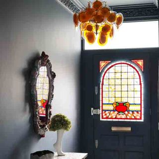 hallway with stained glass door