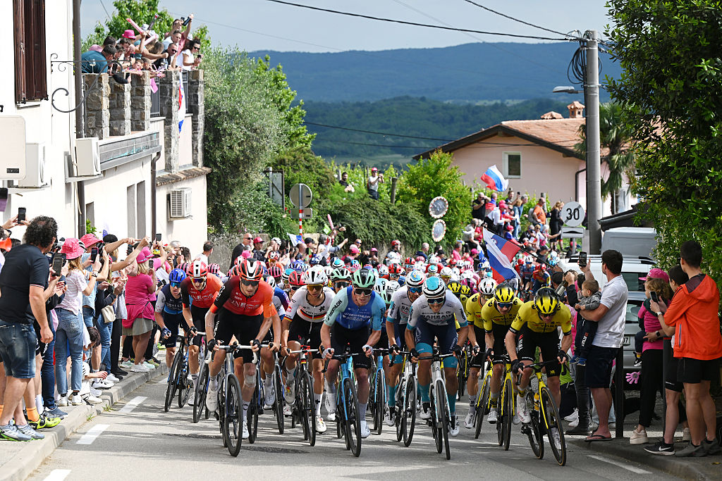 The Giro d&#039;Italia peloton racing through the Italy-Slovenia border city of Gorizia-Nova Gorica on stage 14