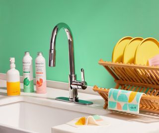 Drew Barrymore's home cleaning line, Fresh Horizons, next to a sink
