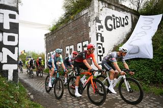 ROUBAIX FRANCE APRIL 13 LR Joshua Tarling of Great Britain and Team INEOS Grenadiers and Mathieu Van Der Poel of Netherlands and Team Alpecin Deceuninck compete passing through the Pont Gibus cobblestones sector during the 122nd Paris Roubaix 2025 a 2592km one day race from Compiegne to Roubaix UCIWT on April 13 2025 in Roubaix France Photo by Dario BelingheriGetty Images