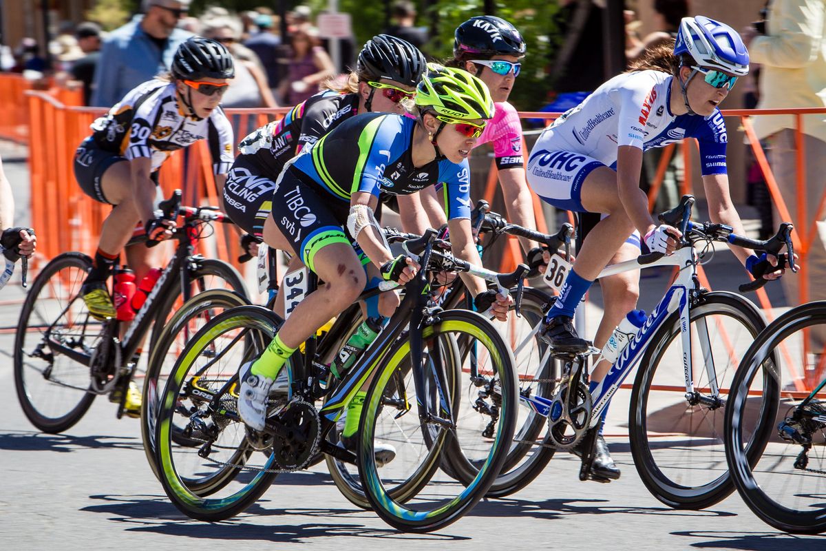 Emily Collins (TIBCO) riding in the field before taking third place