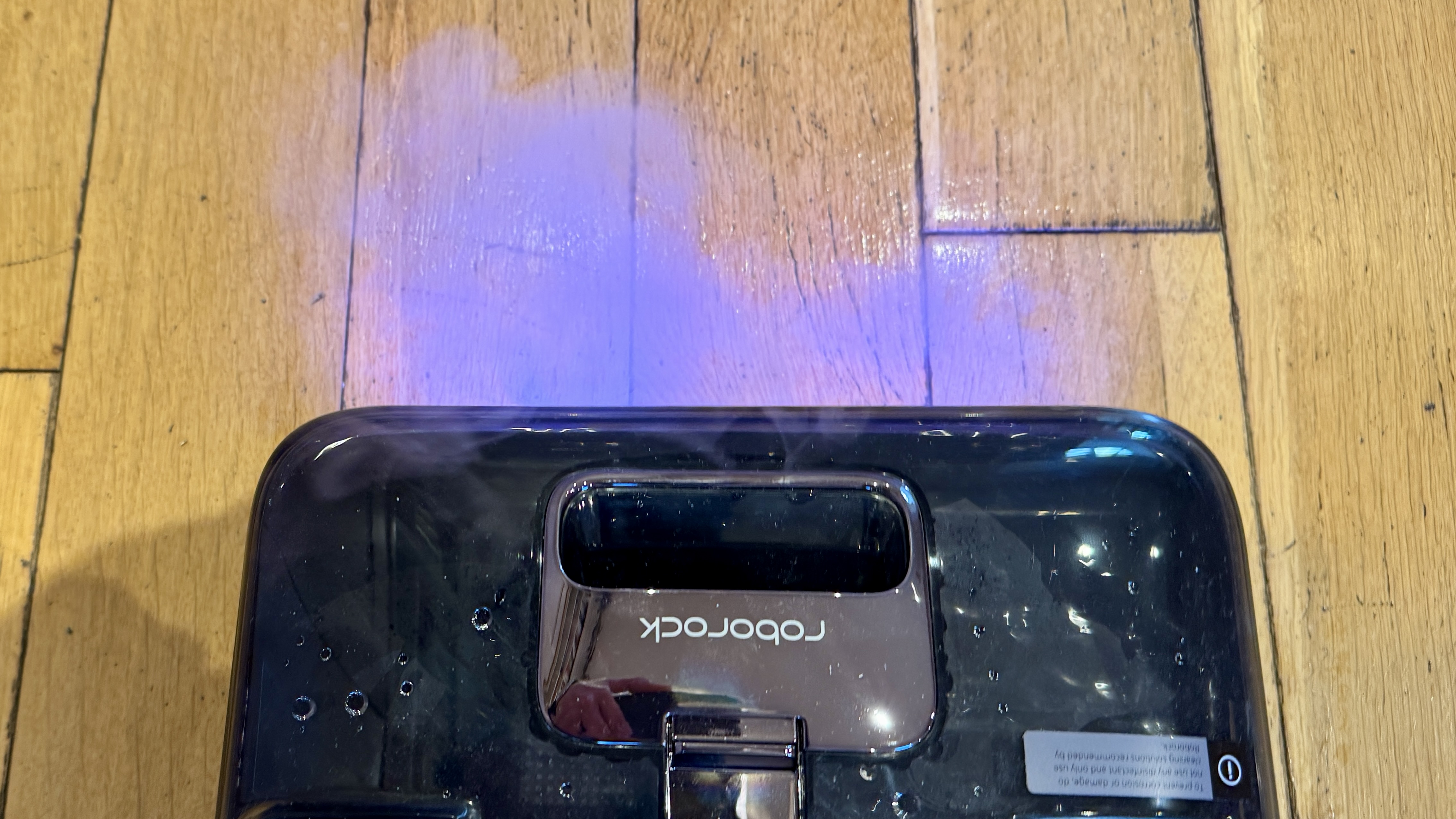 Roborock F25 Ultra emitting steam as it cleans