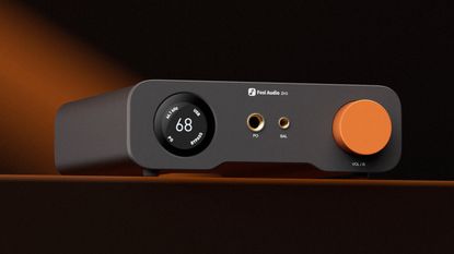 A product shot of the Fosi Audio ZH3 against a black and slightly orange background