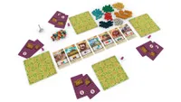 Tiny Towns board game laid out on a table and ready to start playing