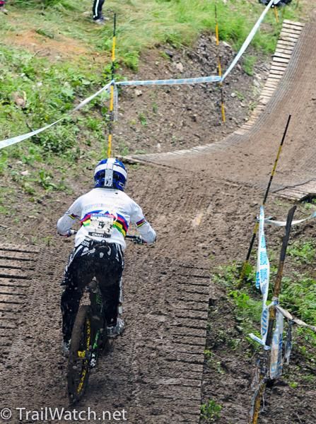 World Champion Emmeline Ragot riding a long section of wooden boards.