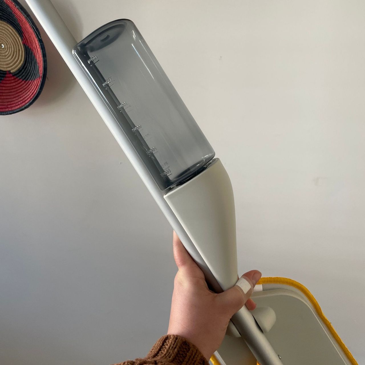 Close up of the water tank of the Joseph Joseph CleanTech 2-in-1 Spray Mop