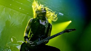 American rock guitarist Nita Strauss performing live on stage as part of Alice Cooper's band at Wembley Arena in London on November 16, 2017.