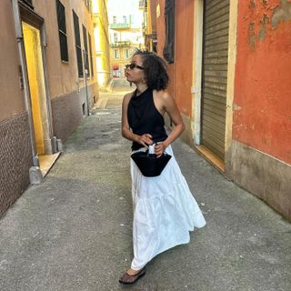 @slipintostyle wearing a summer maxi skirt outfit.