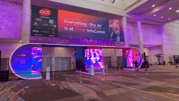 The entrance way to InfoComm 2025 in Orlando with a video display in action. 