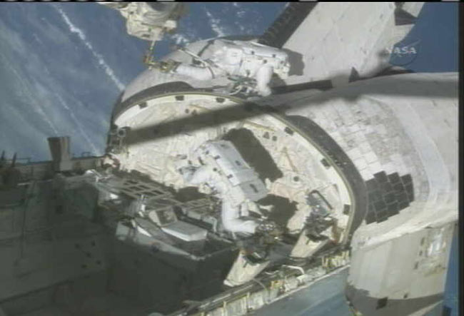 Spacewalkers Test Shuttle Heat Shield Repair Technique