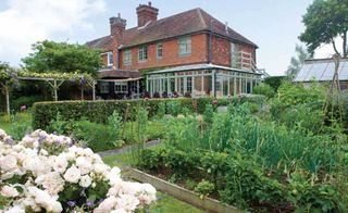 victorian house with connected kitchen gardens