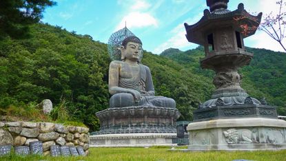 Seated bronze Buddha statue and tiles, Soraksan National Park