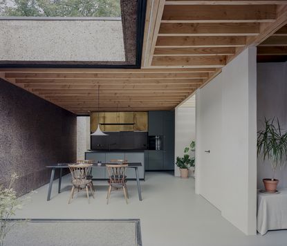 living space with timber ceiling in london cork house extension