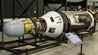 a museum exhibit of a reconnaissance satellite