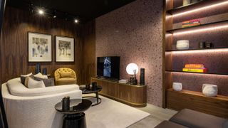 contemporary snug room with built in shelving with led lighting
