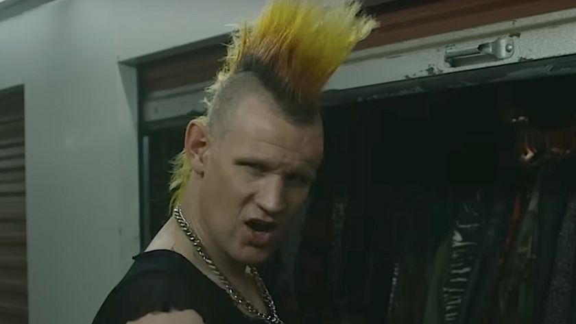 Matt Smith with a big orange and yellow punk mohawk as Russ in Caught Stealing.