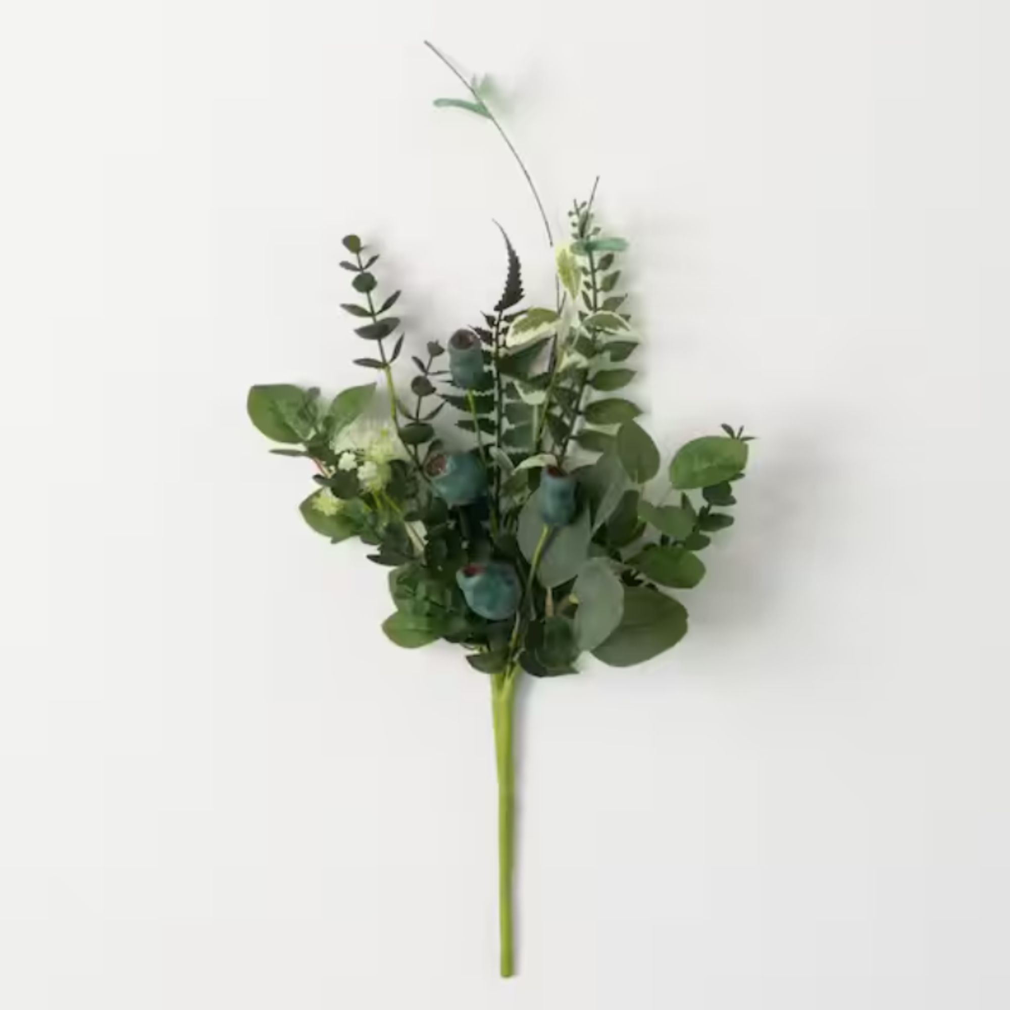 Sprig of faux foliage
