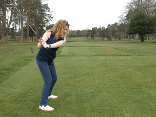 Golf Monthly Top 50 Coach Katie Dawkins demonstrating a golf swing that is on plane in the backswing