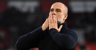 Manchester City manager Pep Guardiola acknowledges the fans after the team's victory during the Premier League match between Southampton FC and Manchester City at Friends Provident St. Mary's Stadium on April 08, 2023 in Southampton, England.