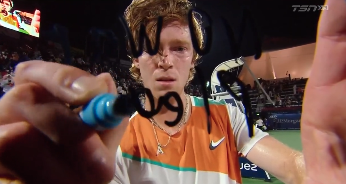 Russian tennis player Andrey Rublev writes 'no war please' on camera