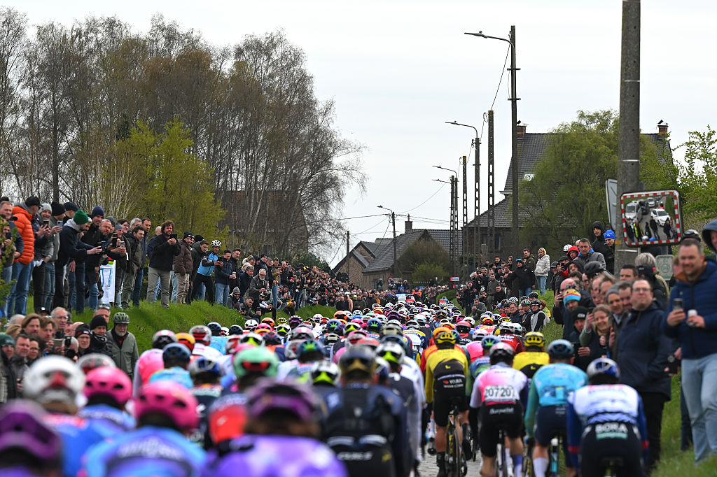 HARELBEKE, BELGIUM - MARCH 27: A general view of the peloton passing through the Holleweg cobblestones sector during the 68th E3 Saxo Classic 2026 a 208.5km one day race from Harelbeke to Harelbek / #UCIWT / on March 27, 2026 in Harelbeke, Belgium. (Photo by Tim de Waele/Getty Images)