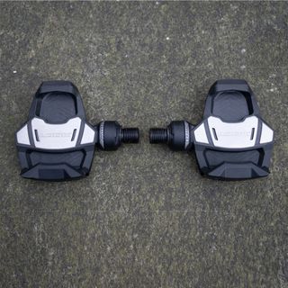 Pair of Look Keo Blade Carbon Ceramic clipless pedals on the ground 