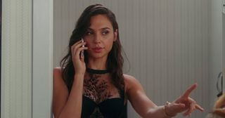 Gal Gadot dons lacy lingerie in trailer for the spy-comedy Keeping