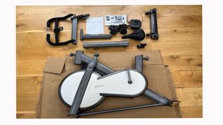 Image shows the Mobi Turbo Exercise Bike in parts.