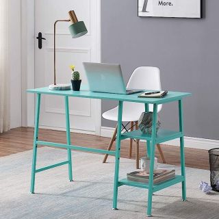 blue desk floating in the middle of a bedroom