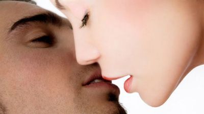 girl and guy kissing