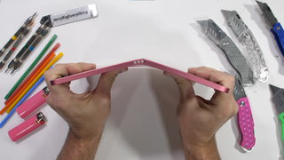 The iPad 2022 bending and snapping during a durability test