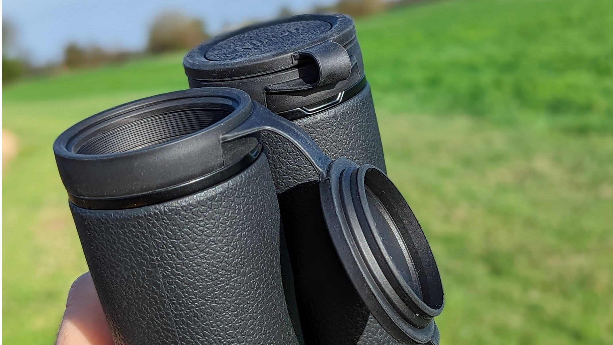 The Nikon Monarch HG 10x42 binocular eye lens covers up close