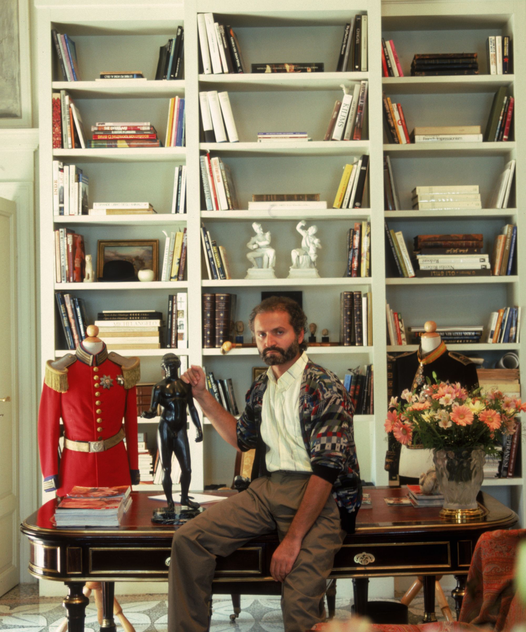 gianni versace in his office