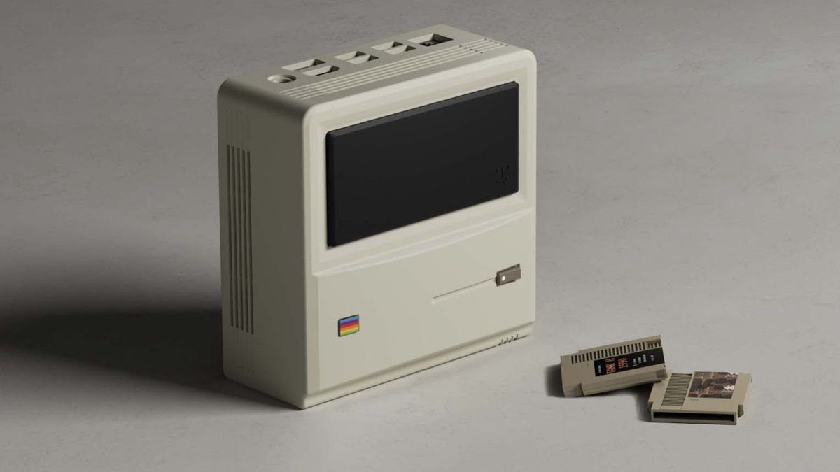 AYANEO Retro Mini PC AM01 on grey table.