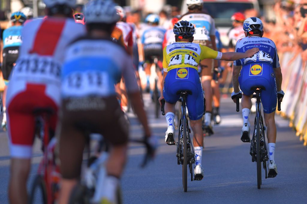 KRAKOW POLAND AUGUST 09 Arrival Remco Evenepoel of Belgium and Team Deceuninck QuickStep Yellow Leader Jersey Dries Devenyns of Belgium and Team Deceuninck QuickStep Celebration during the 77th Tour of Poland 2020 Stage 5 a 188km stage from Zakopane to Krakow TourdePologne tdp20 on August 09 2020 in Krakow Poland Photo by Luc ClaessenGetty Images